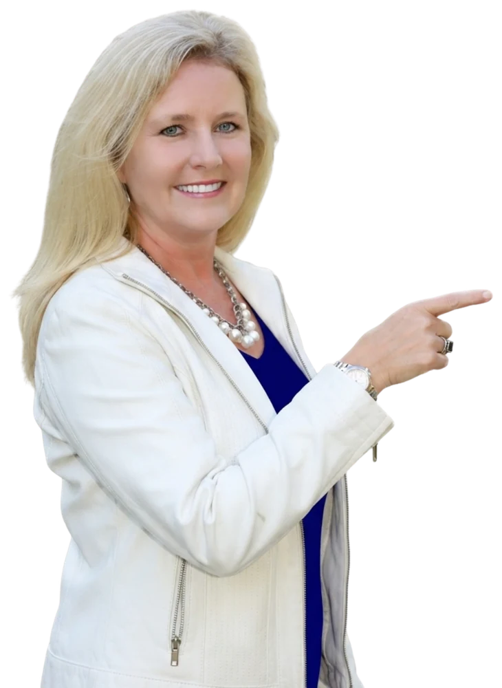 Charlene Hall, East TX Realtor, pointing toward the Google review button