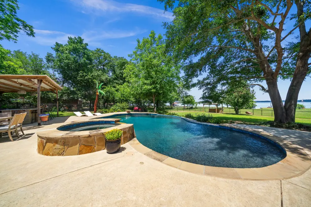 Brand new gunite pool and hot tub with outdoor kitchen and Lake Palestine views, luxury waterfront home Chandler TX