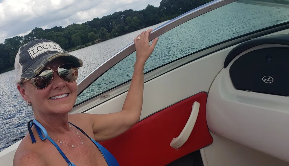 Charlene Hall on her boat on Lake Palestine, a true local