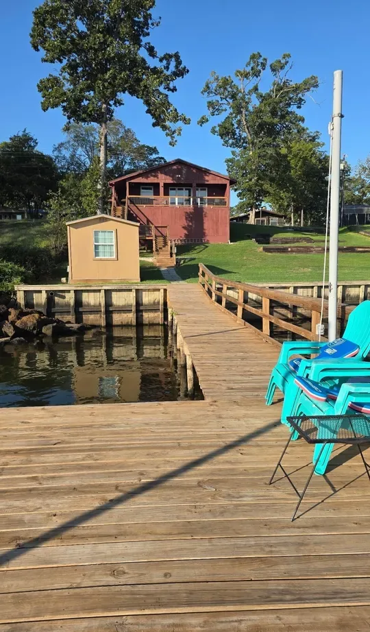 Looking back up the pier at the Brierwood Bay cottage on Lake Palestine near Frankston, Texas.
